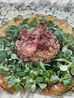 Una foto de Pota con arroz caldoso