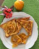 Tostadas francés acompañada de dulce de naranja y piña