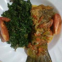 A picture of Marinated Wet fry fish and ugali.