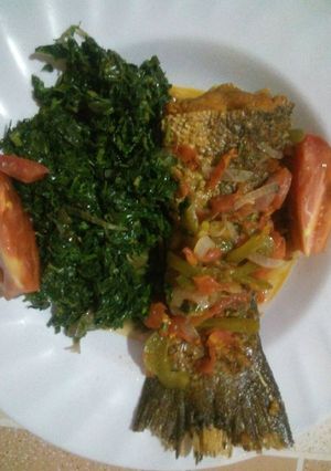 A picture of Marinated Wet fry fish and ugali.