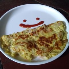 A picture of Cheesy pan cake.