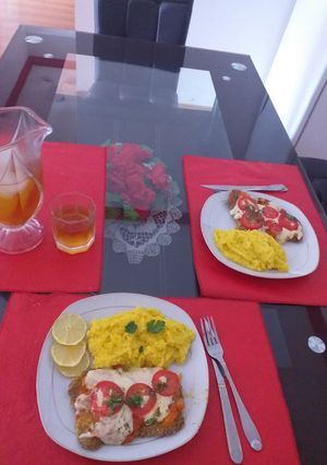 Una foto de Milanesa napolitana