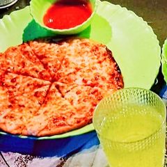 A picture of Barley and gram flour unique Pizzaa.