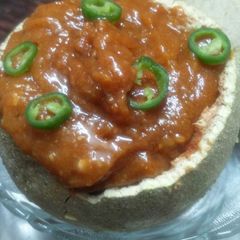 Woodapple (kotha) and chilli chutney A picture of Woodapple (kotha) and chilli chutney.