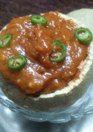 A picture of Woodapple (kotha) and chilli chutney.