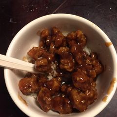 A picture of Sweet and sour pork in one pan.
