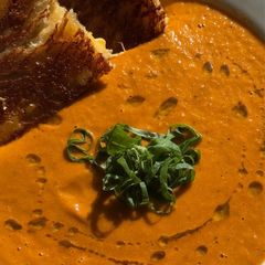 A picture of Roasted Tomato Soup + Grilled Cheese.