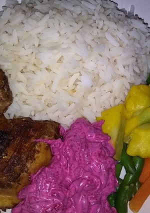 A picture of Baked chicken with steamed vegetables.