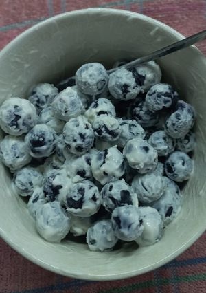 Una foto de Bite de yogurt y arándanos