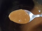 A picture of gravy with chicken broth