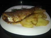 Una foto de trucha al horno con jamón