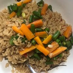A picture of Brown rice and veggie stir fry.