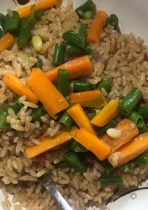 A picture of Brown rice and veggie stir fry.