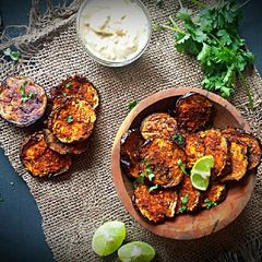 A picture of Backed eggplant chips.