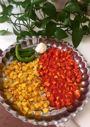 عکسی از دستور خورش مرغ و گوجه شمالی