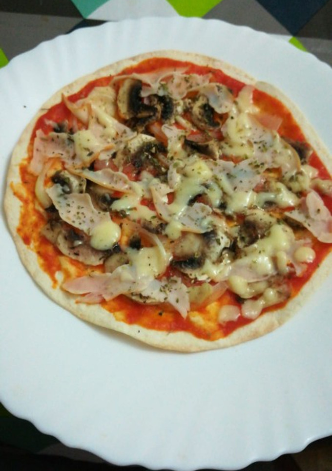 Una foto de Pizza en pan de fajita