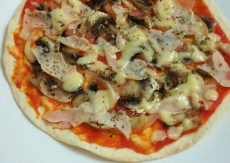Pizza en pan de fajita Receta de Avi Díaz Cookpad