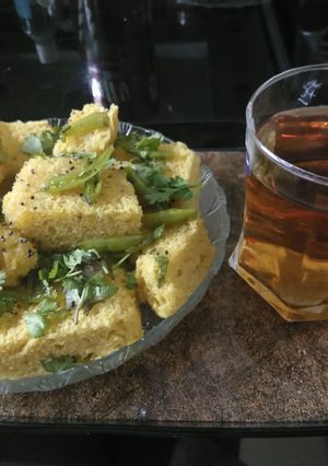 A picture of Khaman with Apple juice homemade recipe both.