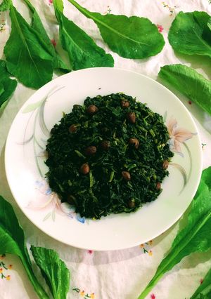 A picture of Bengali style Shorshe Saag / Mustard Greens.