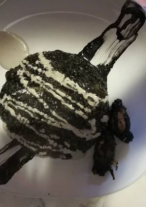 Una foto de Arroz negro con ali oli
