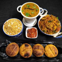 Rajeshthani Thali (Dal Baati With Churma) A picture of Rajeshthani Thali (Dal Baati With Churma).