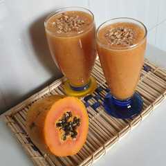 Una foto de Trago refrescante de papaya con melocotón y peras