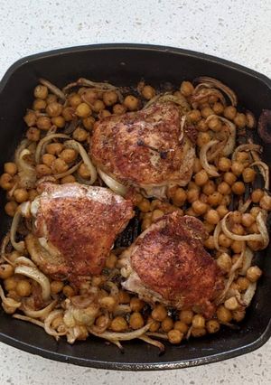A picture of Chicken thighs with chickpeas.