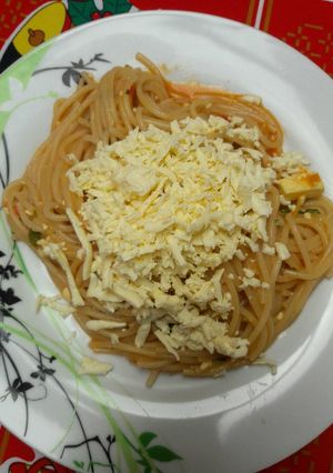 Una foto de Espaguettis con queso