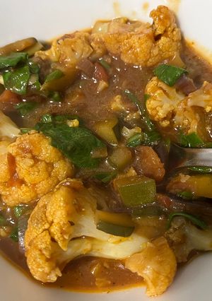A picture of Cauliflower, courgette and spinach curry.