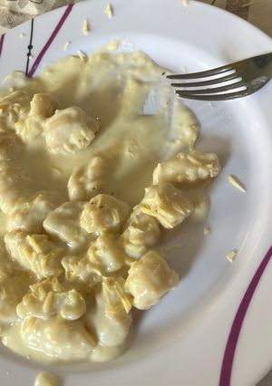 Una foto de Ñoquis de polenta en salsa blanca