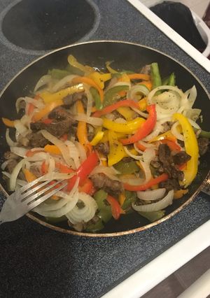 A picture of Steak fajitas.