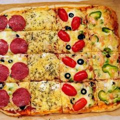 A picture of Pizza four seasons 😍.