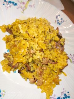 Una foto de Arroz con pollo