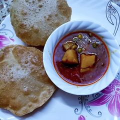 A picture of Aloo matar.