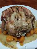Pollo entero asado al carbón con papas y zanahoria