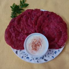 A picture of Beetroot Rava Uttapam.