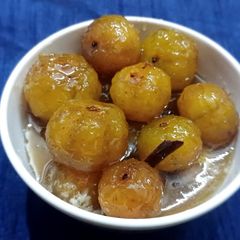 Gooseberry murabba A picture of Gooseberry murabba.
