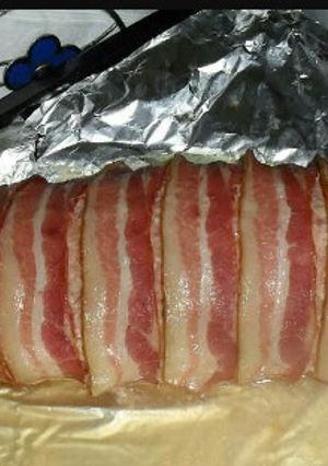 Foto principal de Carne molida rellena de amarillo envuelto en tocineta