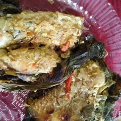 Katla fish in gourd leaves A picture of Katla fish in gourd leaves.