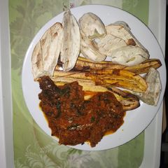 A picture of Roasted plantain, potato and pepper sauce.