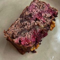 A picture of Loaded raspberry ganache loaf.