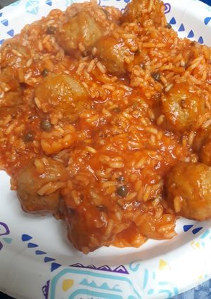 A picture of Red Rice with Meatballs.