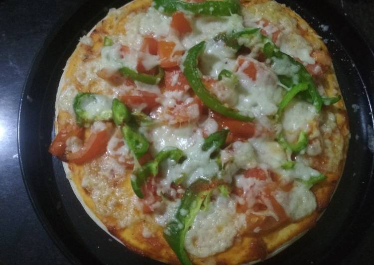 How to Prepare Homemade Tomato Capsicum Pizza