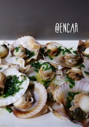 Una foto de Volandeiras con salsa verde