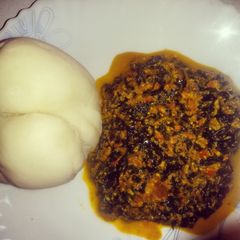 A picture of Pounded yam and egusi soup.