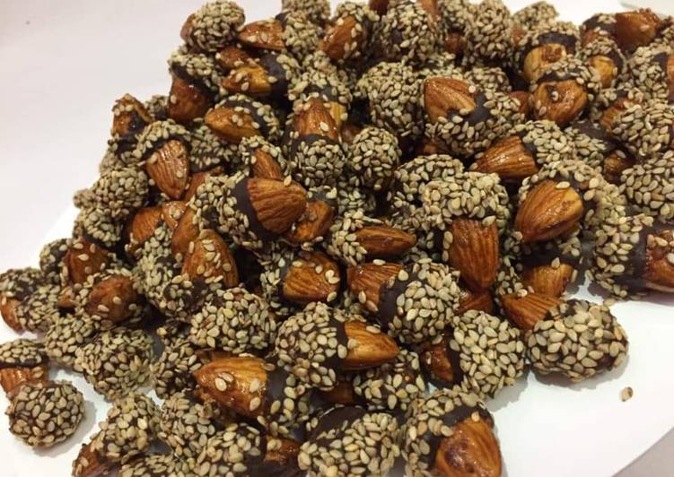 Chocolate  badam coated with  sesame seeds