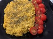 Una foto de risotto tomates cherry