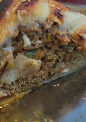 Una foto de Wellington vegano con papas mashed