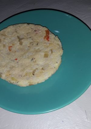 Una foto de Hambur de arroz y garbanzos