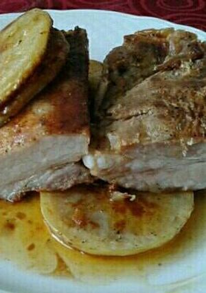 Foto principal de Costillas de cerdo al horno, macerada con especias y mostaza
